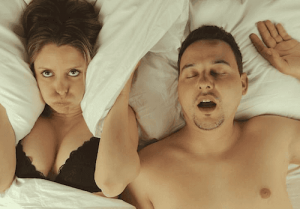 snoring man keeps wife awake