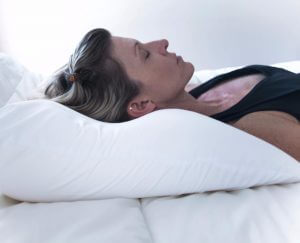 Woman sleeping on a pillow