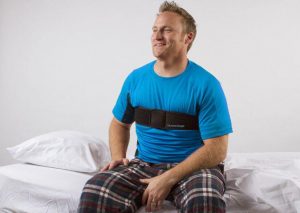 man on bed using slumberbump