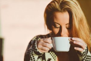 woman drinking coffee woman drinking coffee