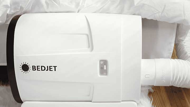 bedjet machine sits next to bed