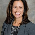 Woman smiling in business attire